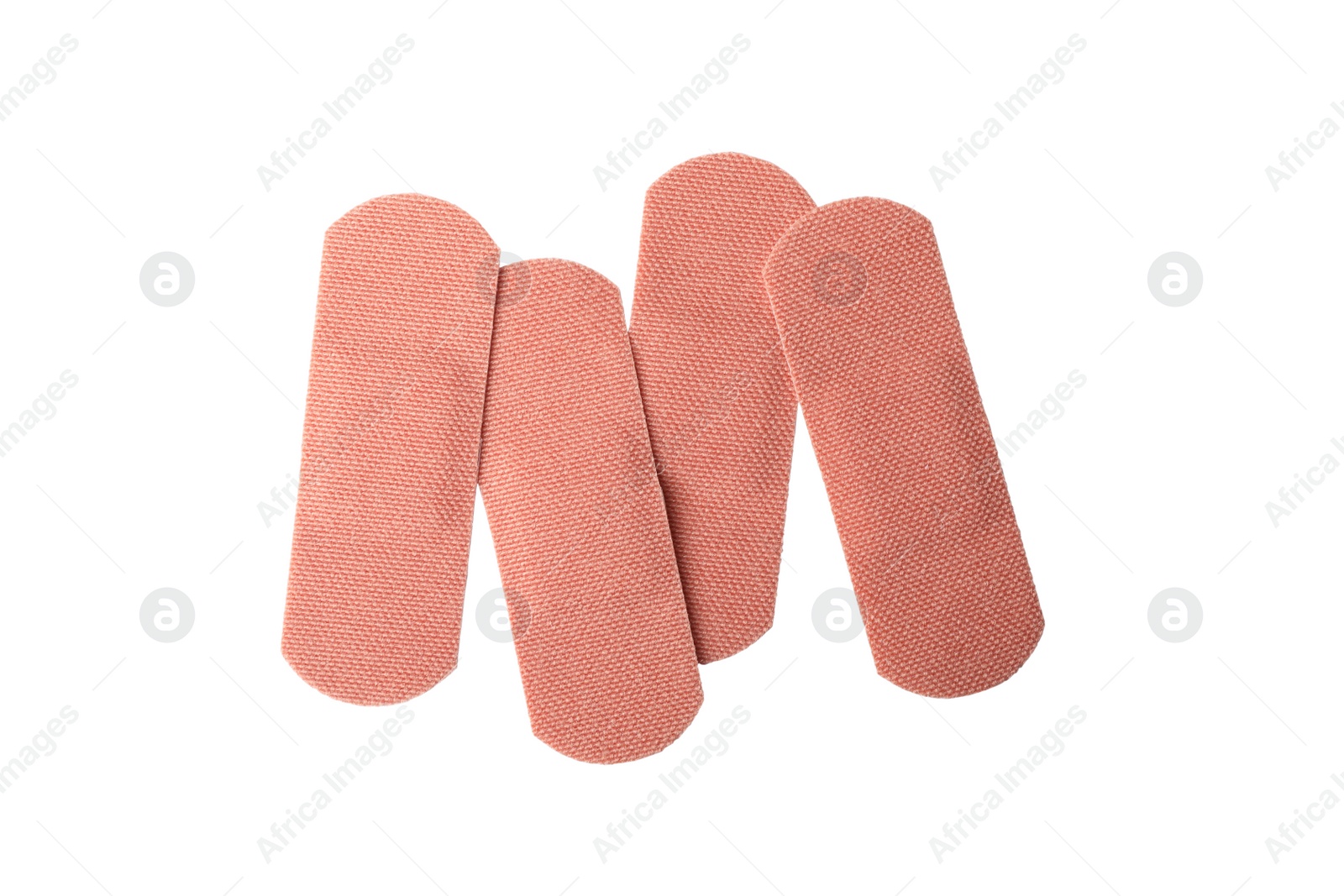 Medical sticking plasters isolated on white. First aid item Photo of Medical sticking plasters isolated on white. First aid item