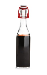 Photo of Bottle with balsamic vinegar on white background