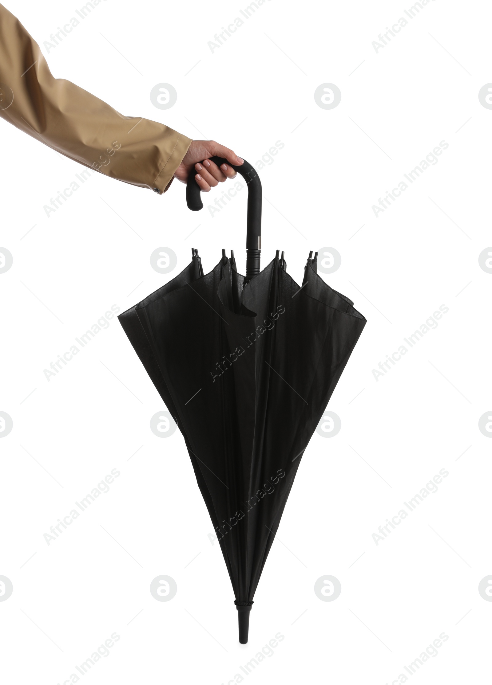 Photo of Woman with closed black umbrella on white background, closeup