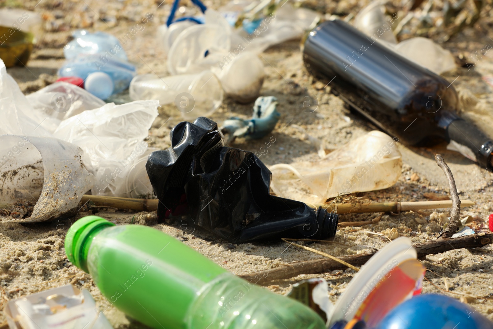 Photo of Garbage scattered on beach. Environment pollution problem