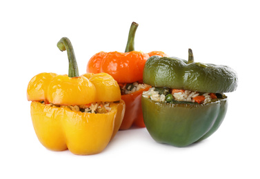 Photo of Tasty stuffed bell peppers isolated on white