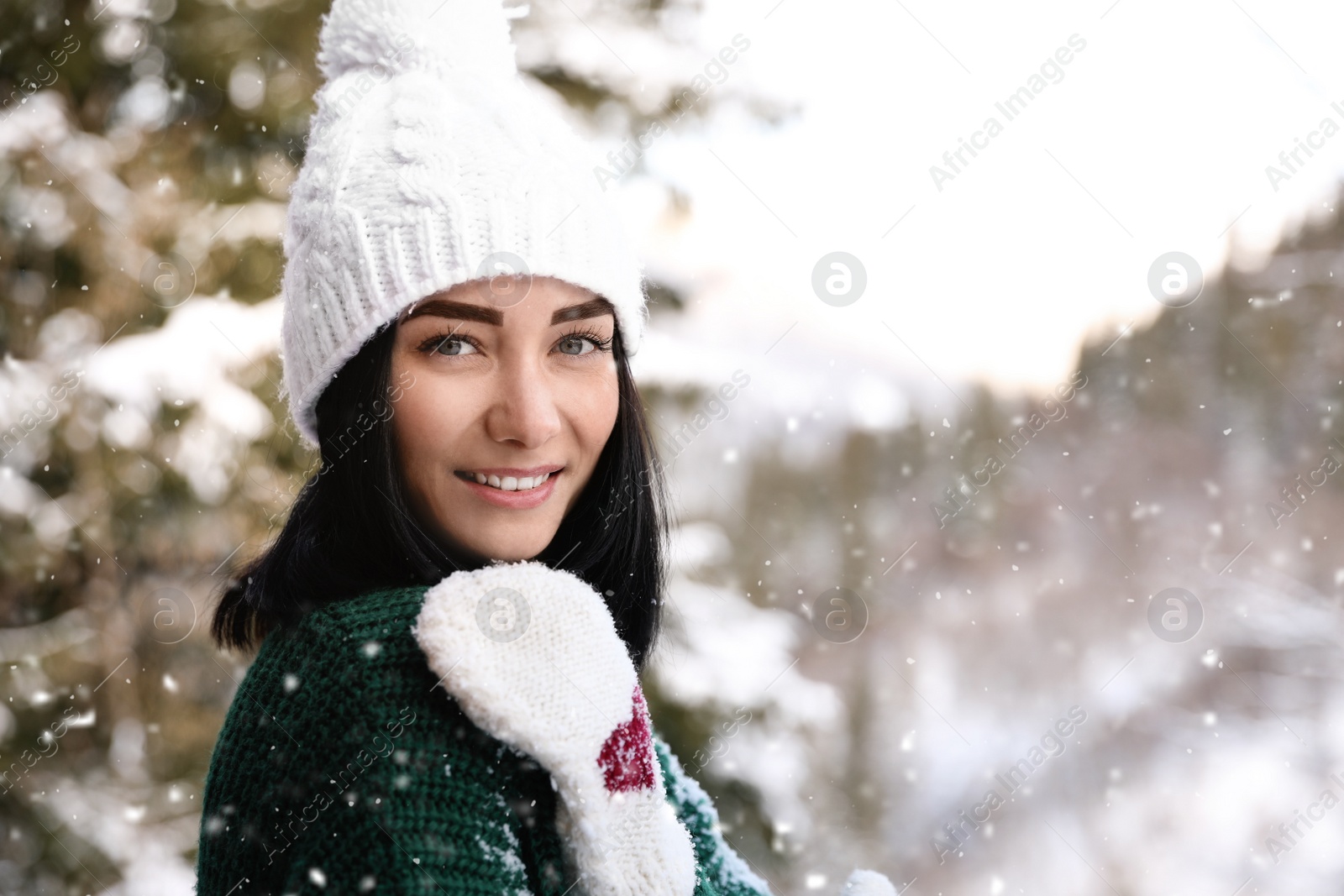 Photo of Portrait of beautiful young woman on winter day