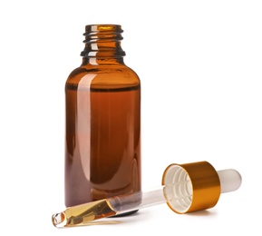 Photo of Cosmetic bottle and pipette with essential oil on white background