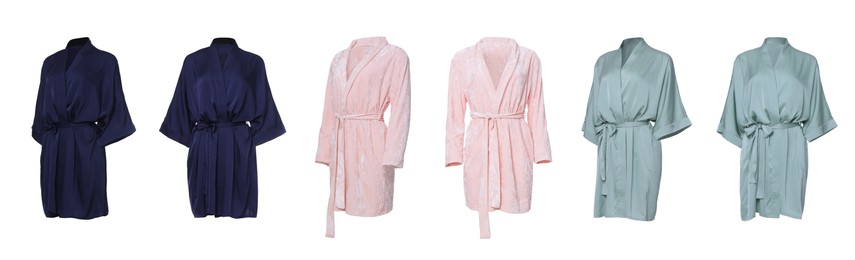 Image of Set of different bathrobes on white background