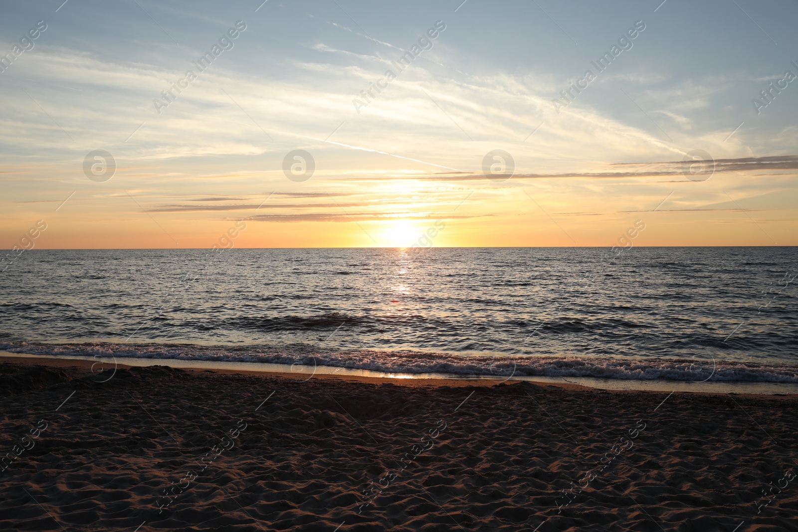 Photo of Picturesque view of sea at sunset. Tropical beach