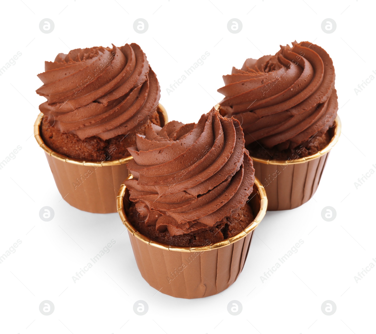 Photo of Three delicious chocolate cupcakes isolated on white