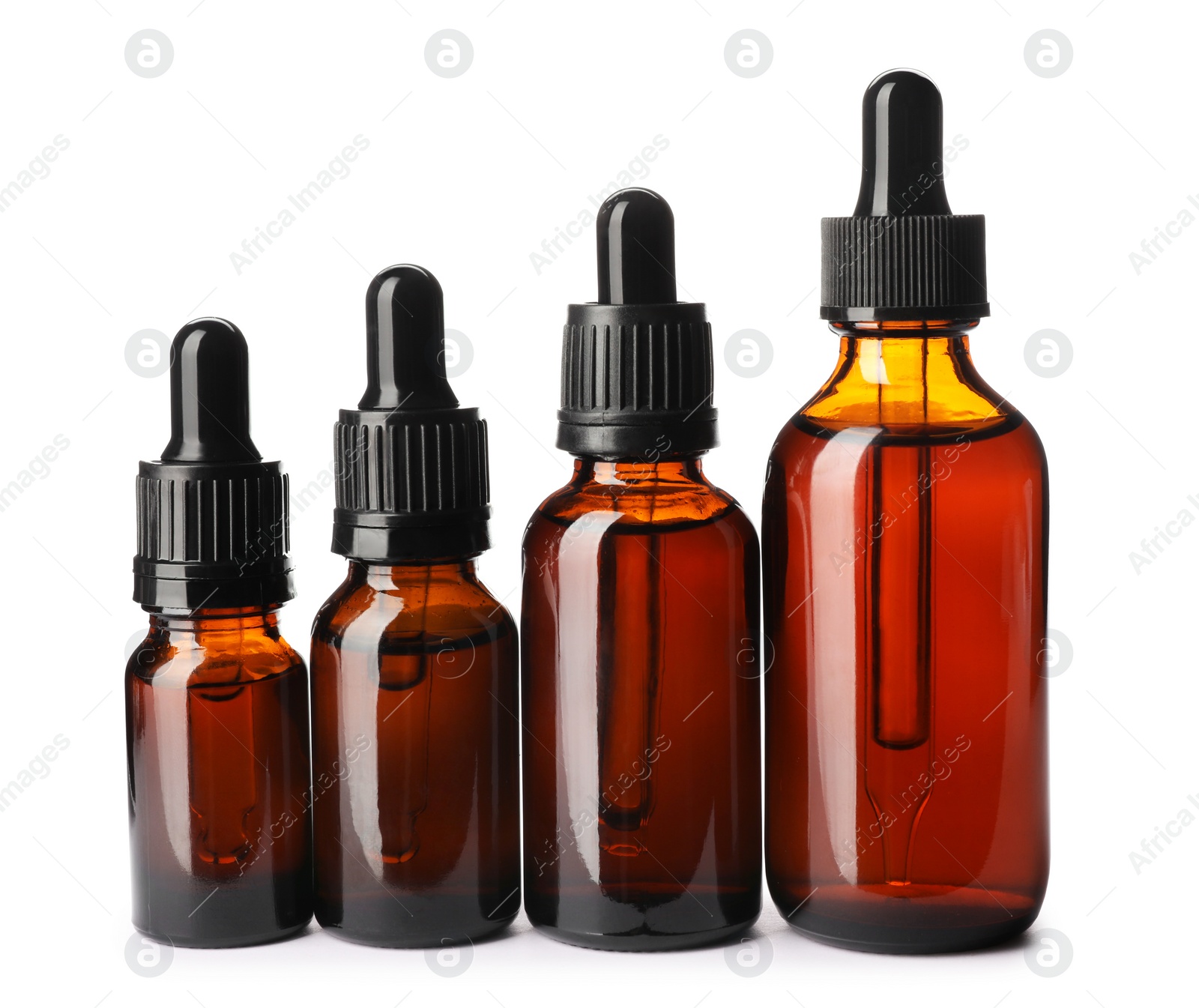 Photo of Cosmetic bottles of essential oils on white background