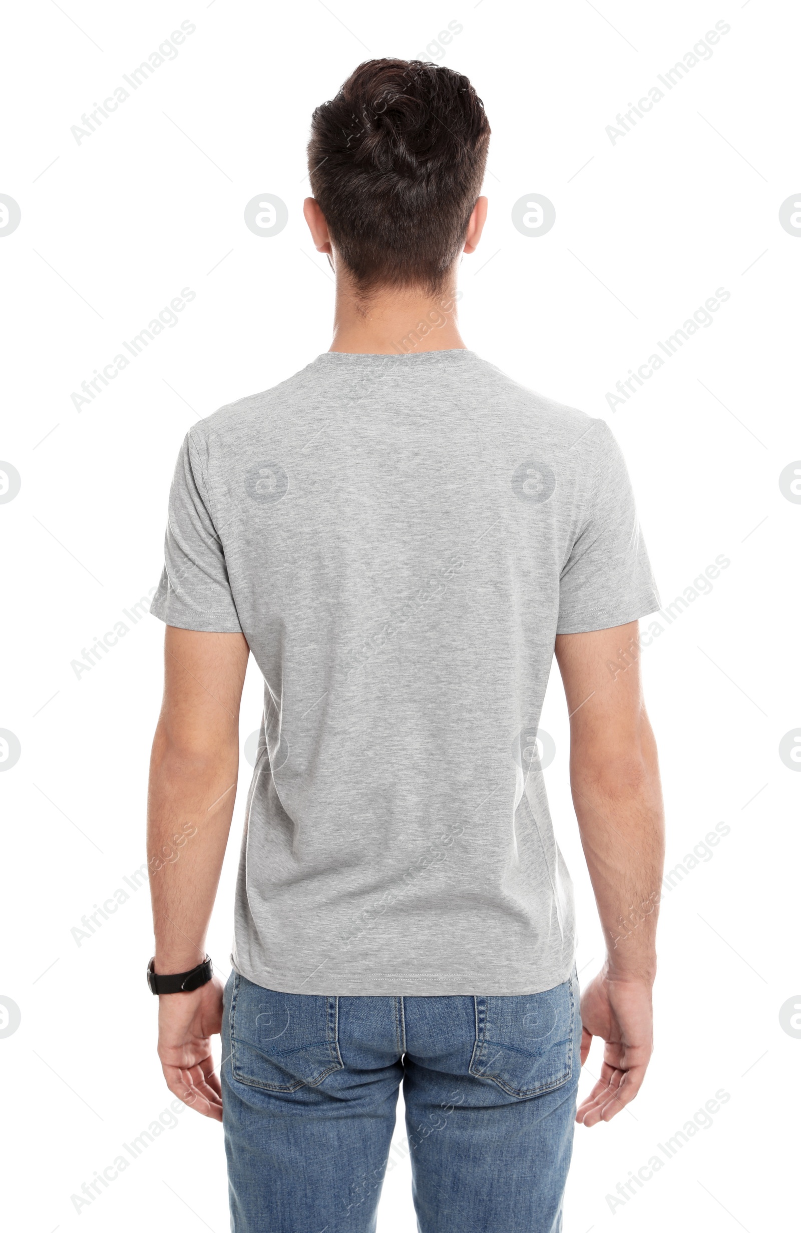 Photo of Young man in t-shirt on white background. Mock up for design