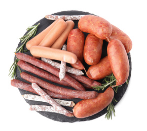 Slate plate with different tasty sausages isolated on white, top view