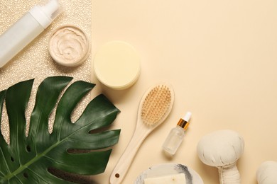 Bath accessories. Flat lay composition with personal care products on beige background, space for text