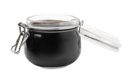 Glass jar with balsamic glaze isolated on white