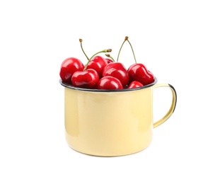 Photo of Metal mug with ripe sweet cherries on white background