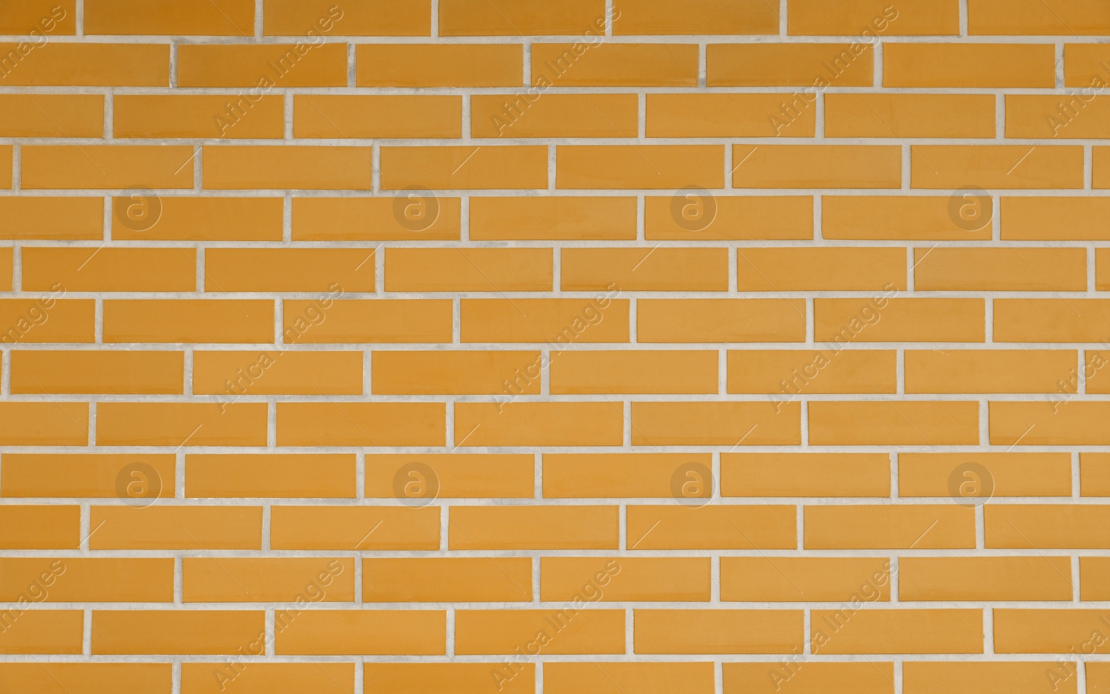 Image of Texture of orange color brick wall as background