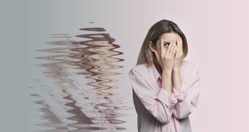 Image of Scared woman having hallucination on light background. Distorted image