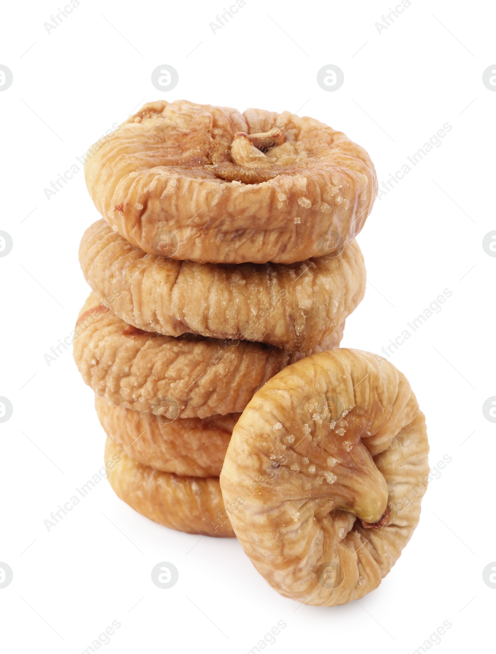 Photo of Stacked tasty dried figs isolated on white