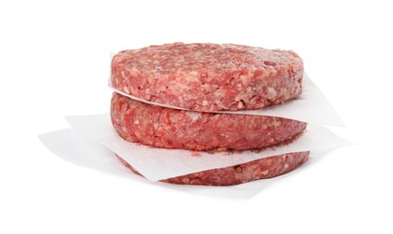 Photo of Stack of raw hamburger patties on white background