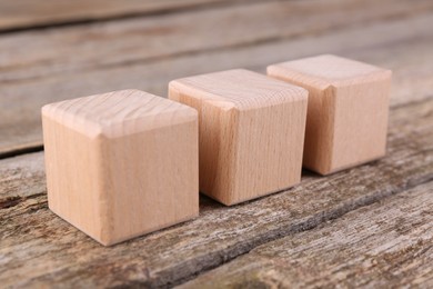 International Organization for Standardization. Cubes with abbreviation ISO on wooden table, closeup