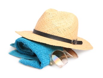 Photo of Straw hat, blue terry towel and sunglasses isolated on white. Beach objects