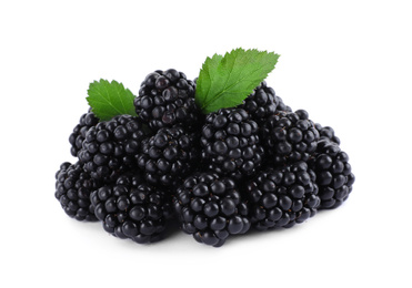 Tasty ripe blackberries and leaves on white background