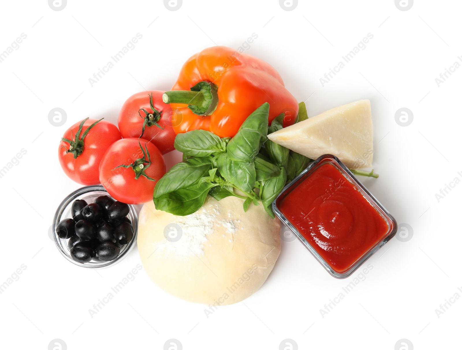 Photo of Composition with dough and fresh ingredients for pizza isolated on white, top view