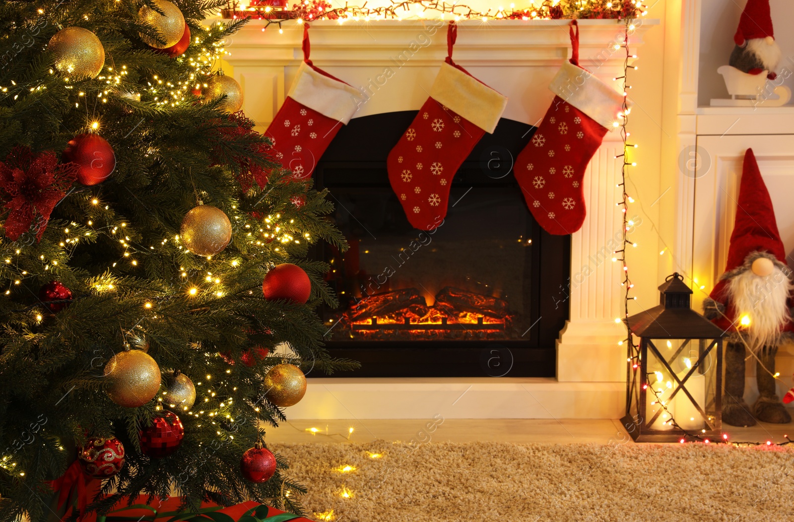 Photo of Living room interior with fireplace and festive decor. Christmas celebration