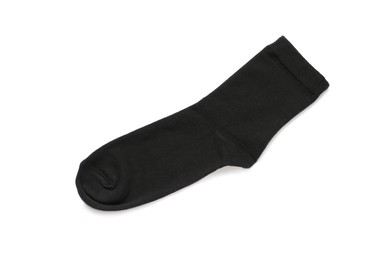Photo of Black sock isolated on white, top view