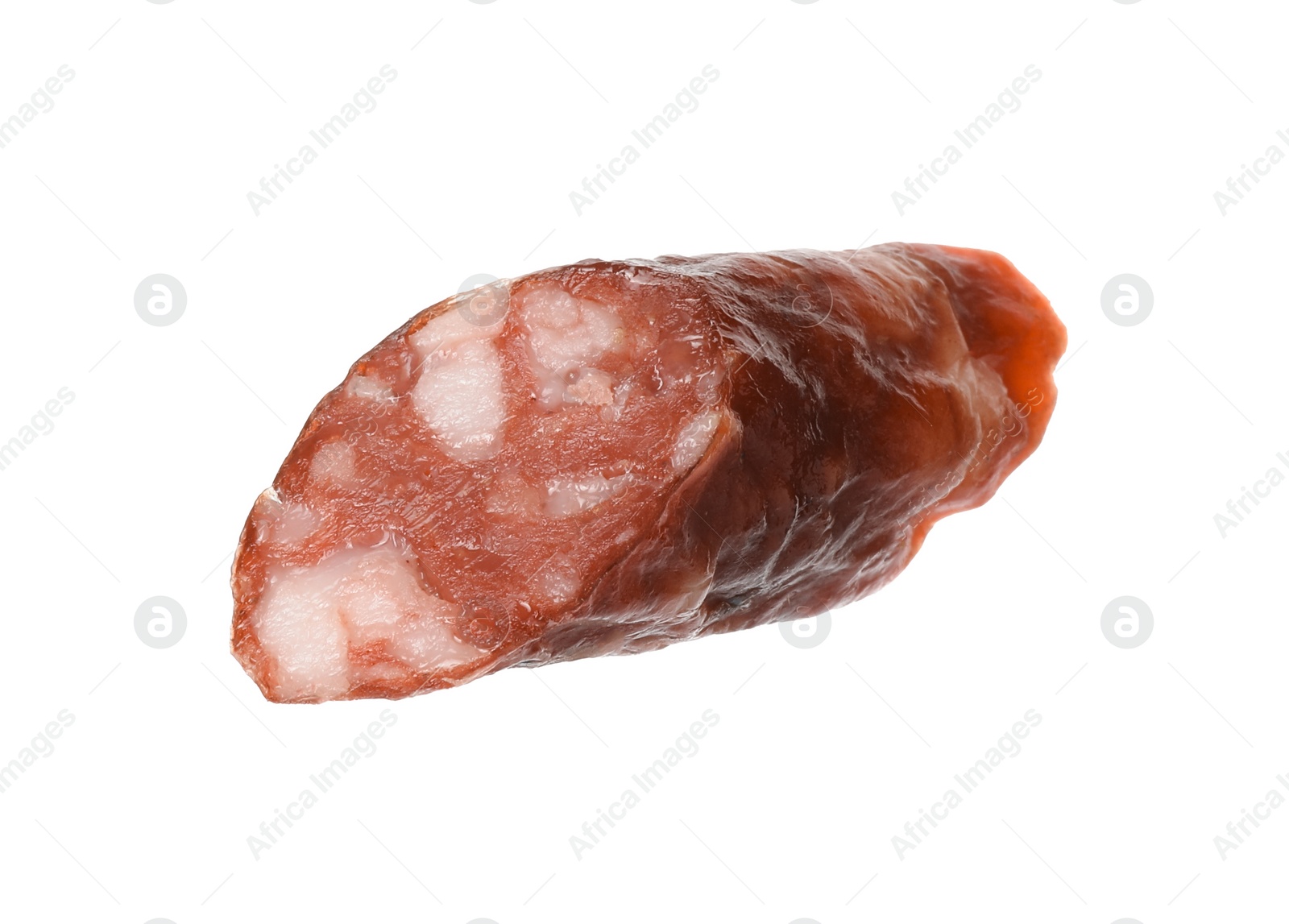 Photo of Piece of thin dry smoked sausage isolated on white