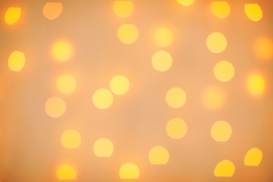 Photo of Beautiful gold lights as background. Bokeh effect