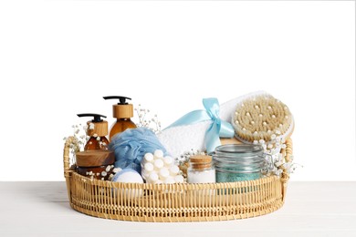 Spa gift set with different personal care products on table against white background