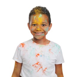 African American boy covered with colorful powder dyes on white background. Holi festival celebration