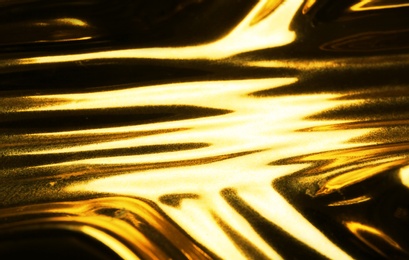 Closeup view of shiny golden surface as background