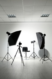 Photo of Interior of modern photo studio with professional equipment