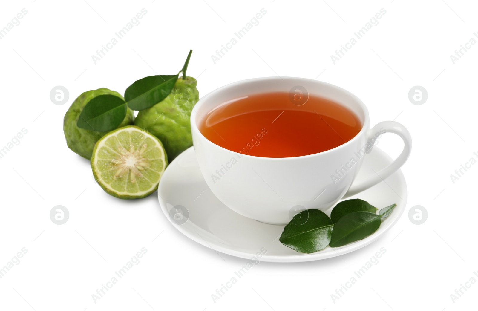 Photo of Cup of tasty bergamot tea and fresh fruits on white background