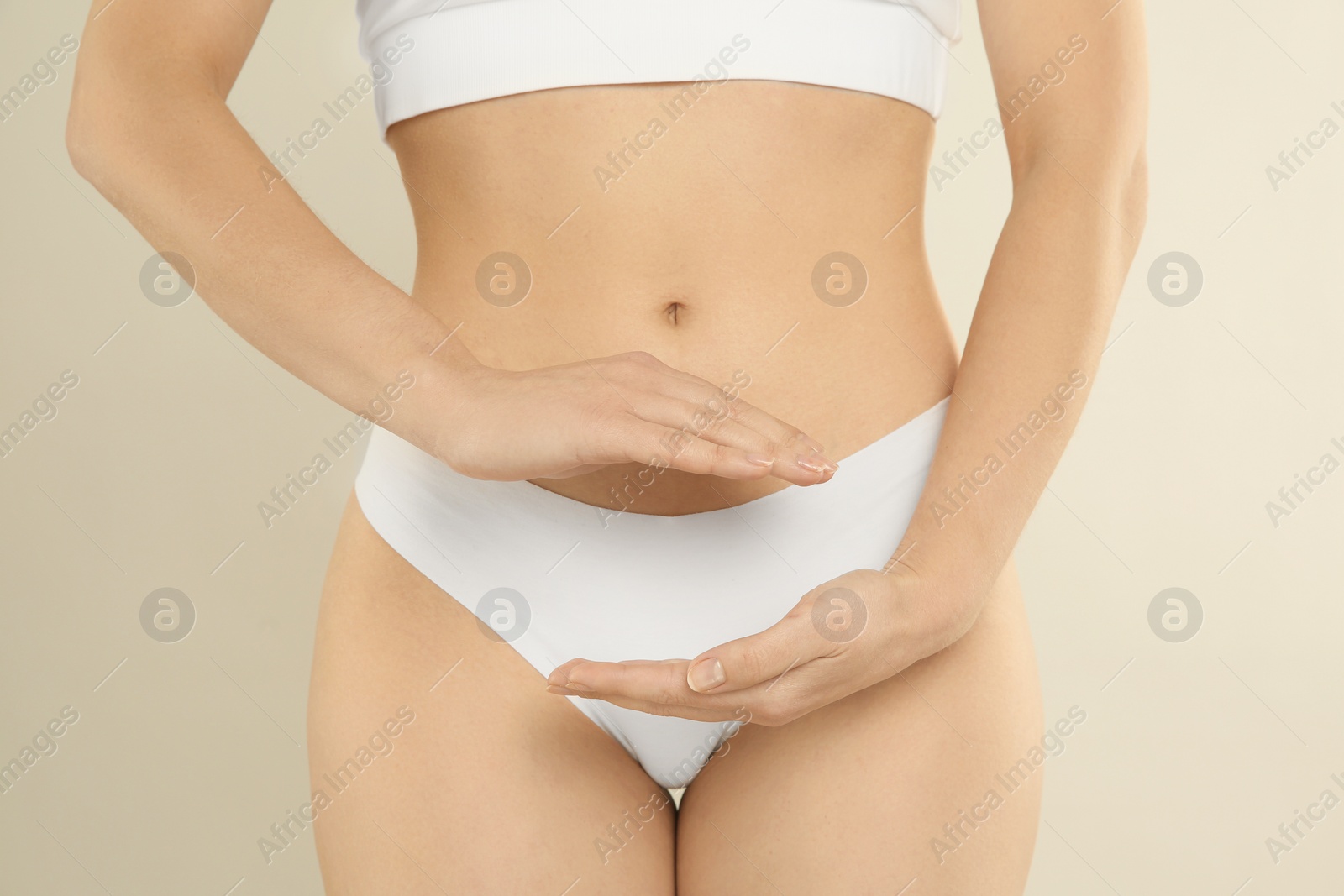 Photo of Gynecology. Woman in underwear on light background, closeup