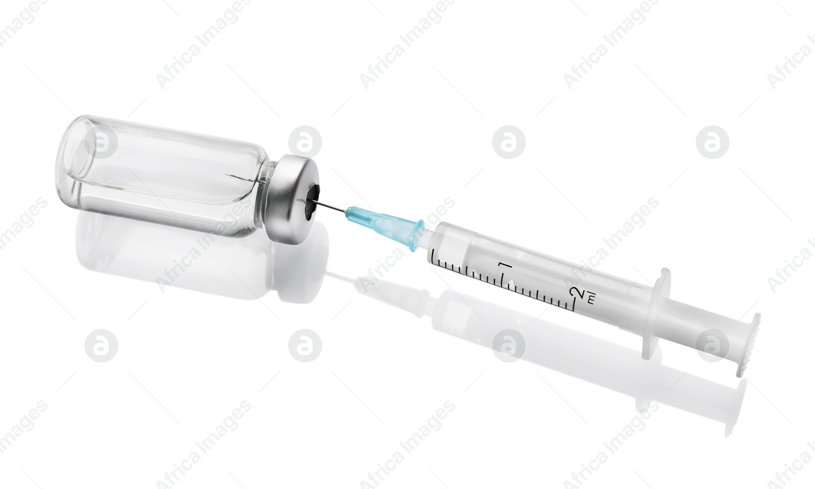 Photo of Disposable syringe with needle and vial on white background