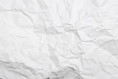 Sheet of white crumpled paper as background, closeup