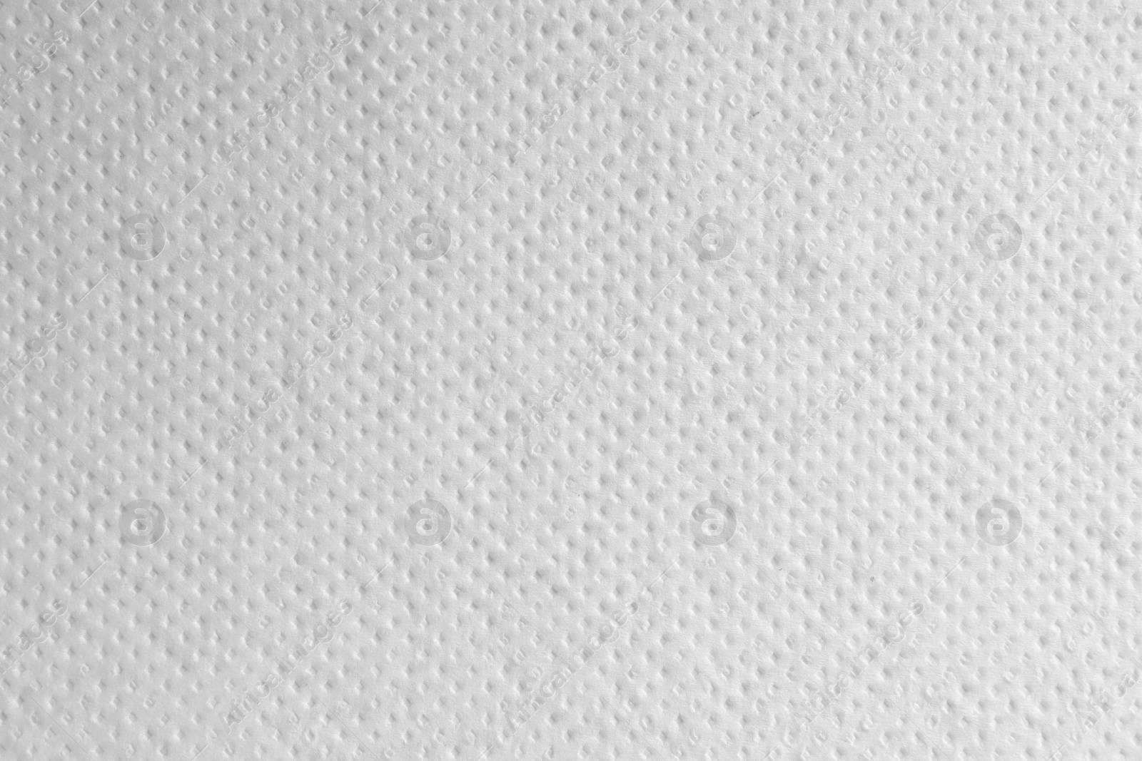 Photo of Texture of paper towel as background, closeup view