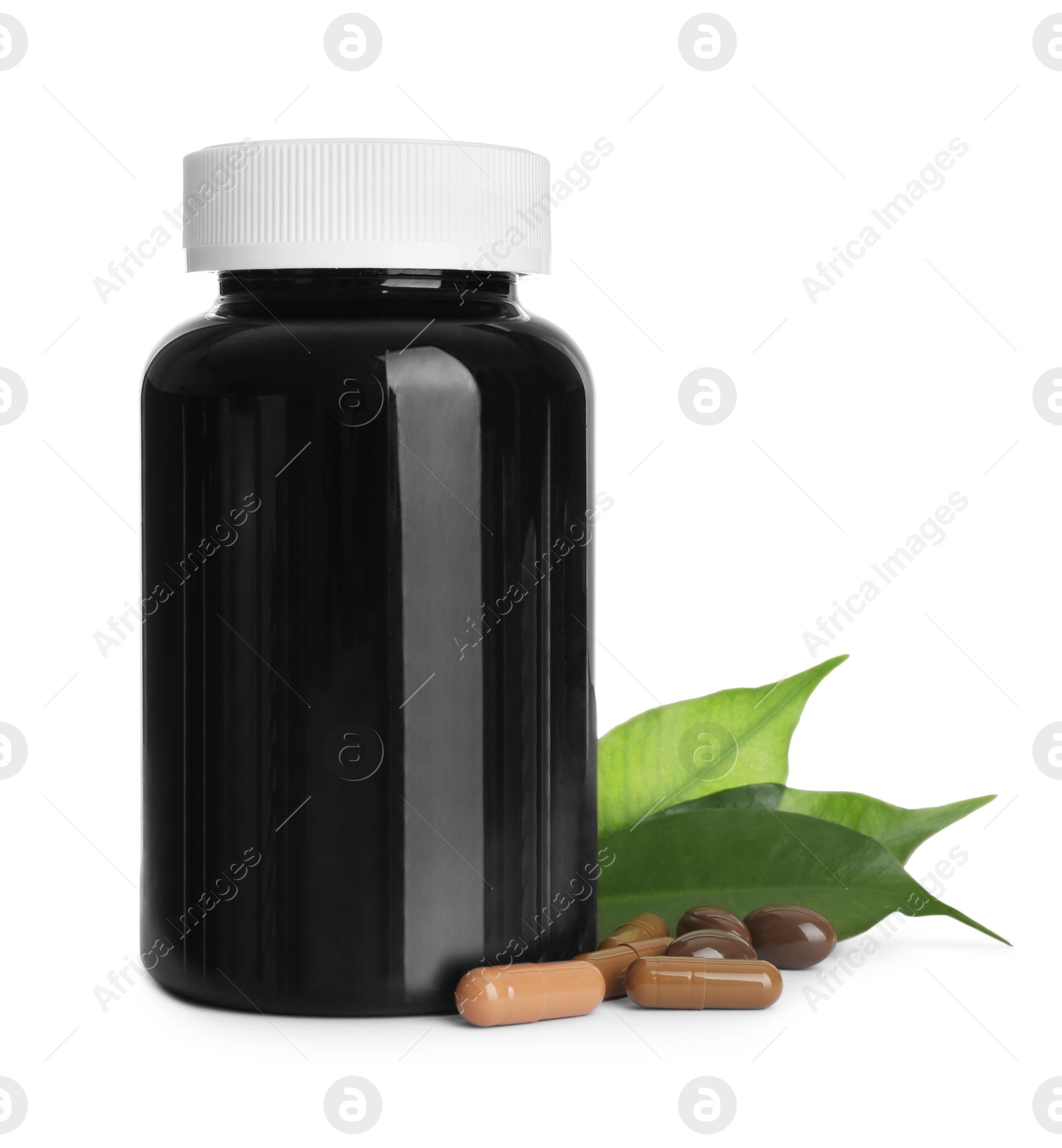 Photo of Bottle with vitamin capsules and green leaves on white background