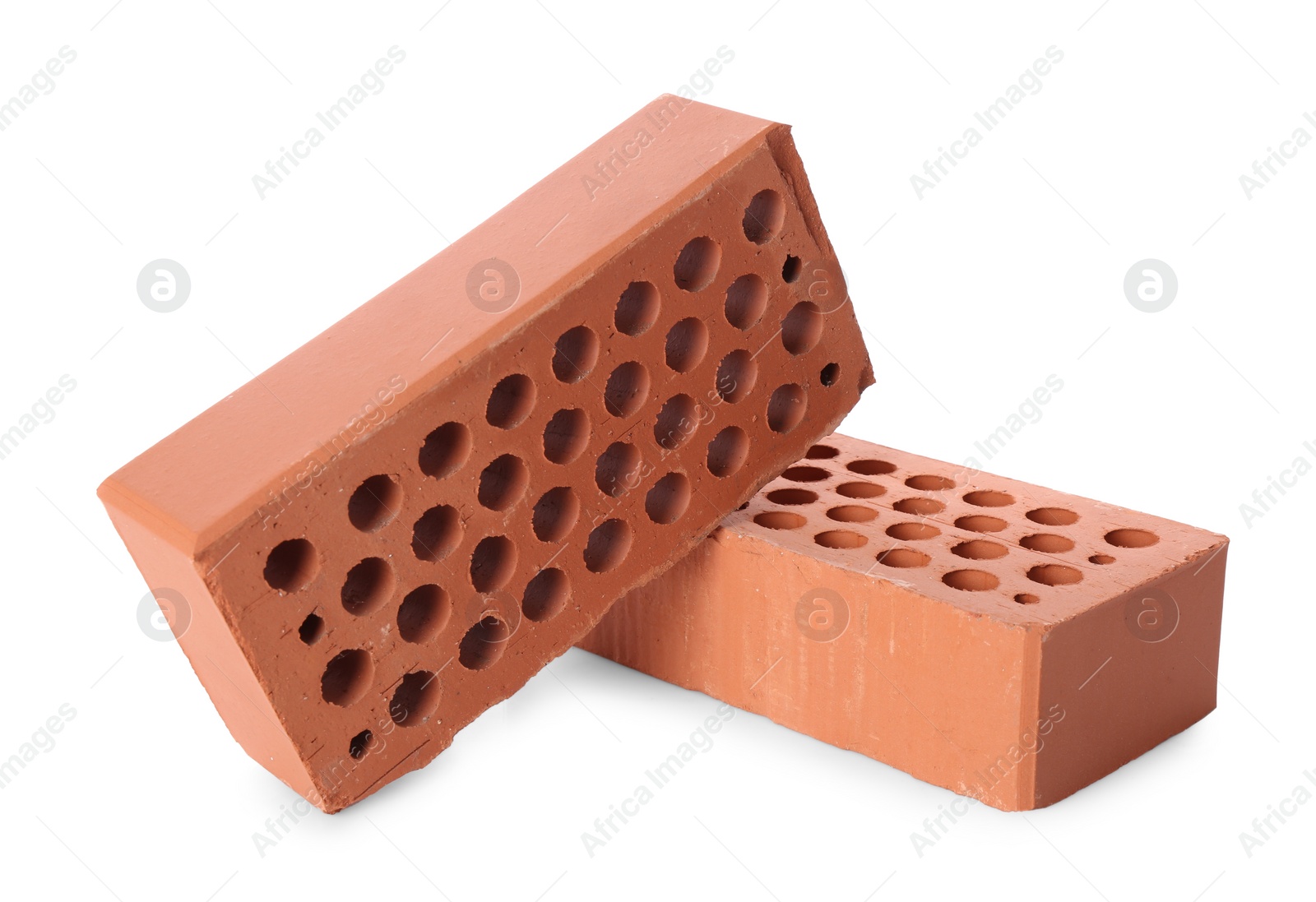 Photo of Two red bricks isolated on white. Building material