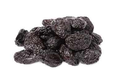 Pile of sweet dried prunes on white background