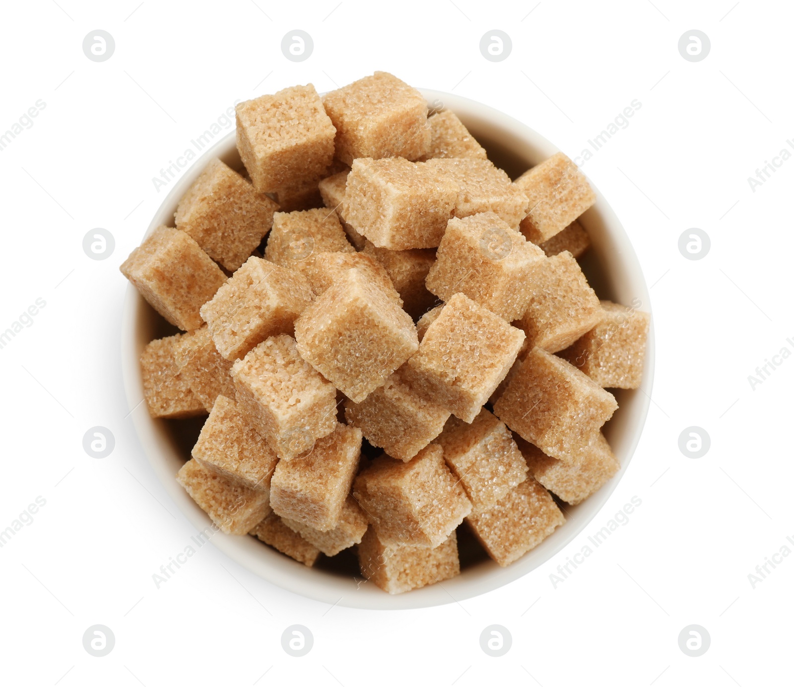 Photo of Bowl with cubes of brown sugar isolated on white, top view