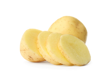 Photo of Whole and cut fresh raw organic potatoes on white background