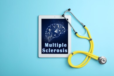 Image of Multiple Sclerosis concept. Stethoscope and tablet on turquoise background, flat lay