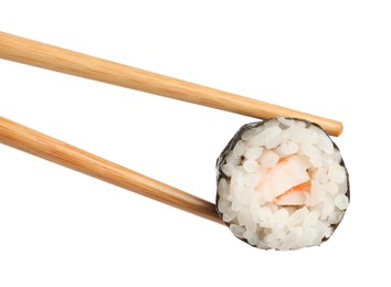 Chopsticks with tasty fresh sushi roll isolated on white