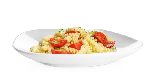 Tasty pasta salad with basil and fresh tomatoes on white background