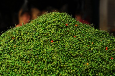 Photo of Heap of fresh delicious chiltepin at market