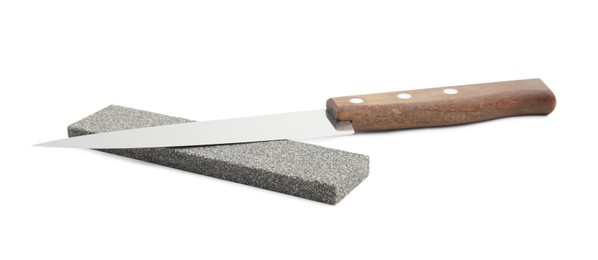 Photo of Sharpening stone and knife on white background