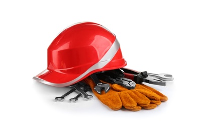 Photo of Composition with safety equipment and construction tools on white background