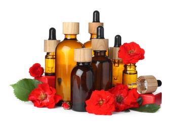 Photo of Different essential oils in bottles and beautiful flowers on white background