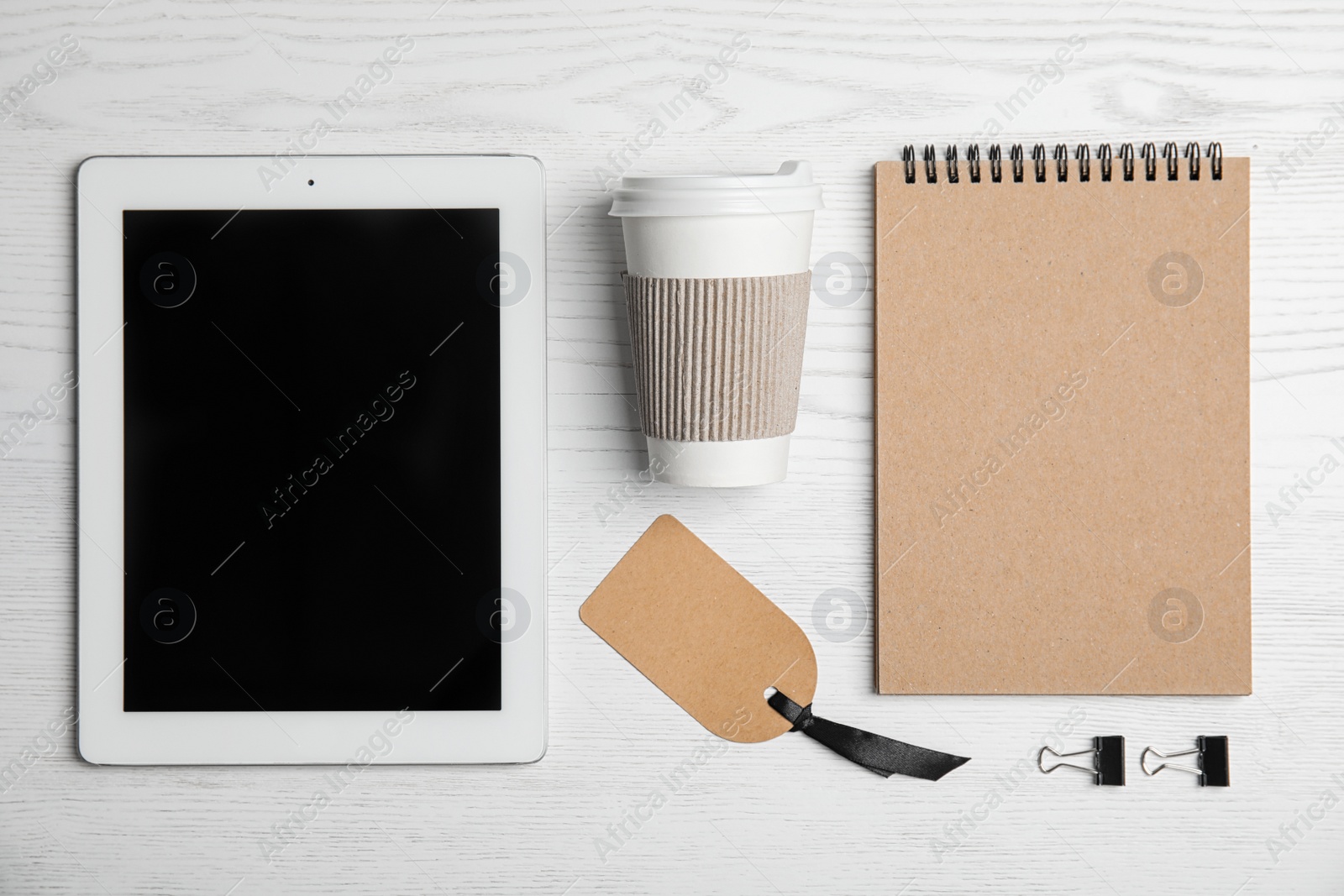 Photo of Flat lay composition with stationery on white wooden background. Mock up for design